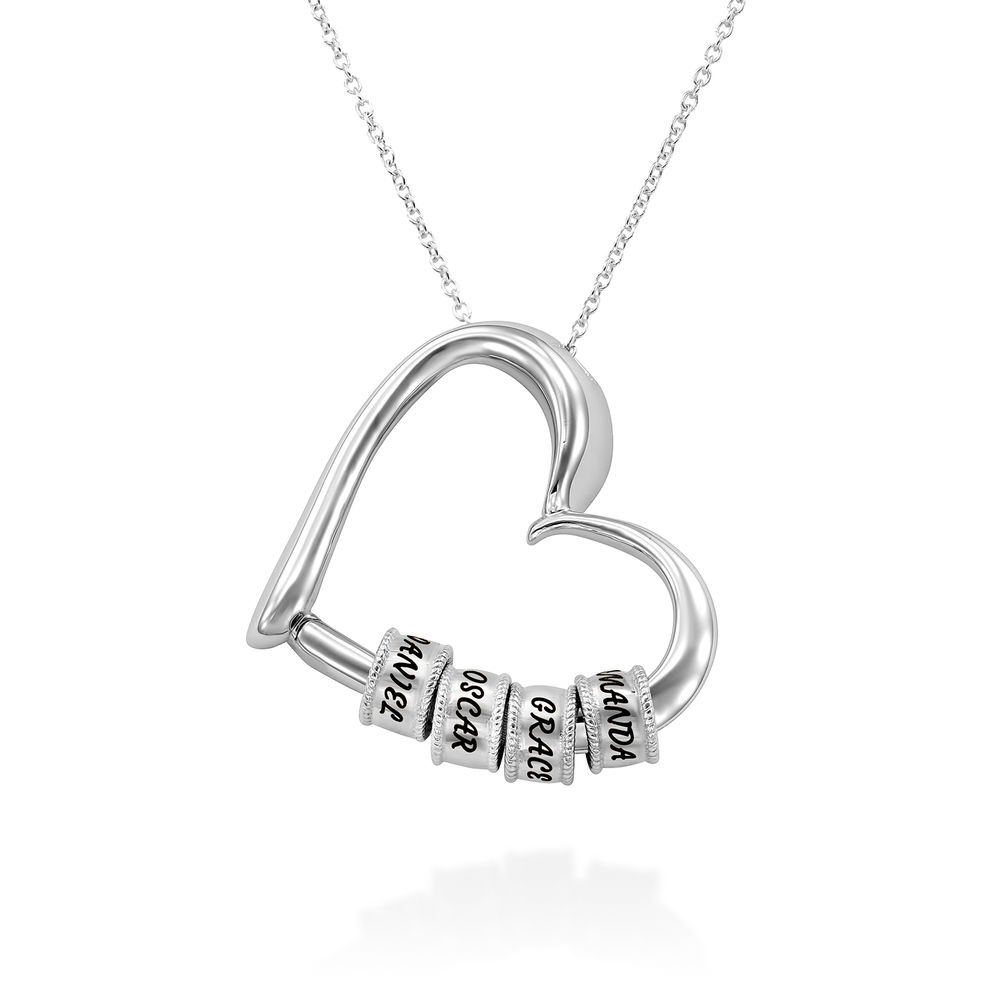 Charmevolle Herz-Halskette mit eingravierten Perlen in Sterling Silber