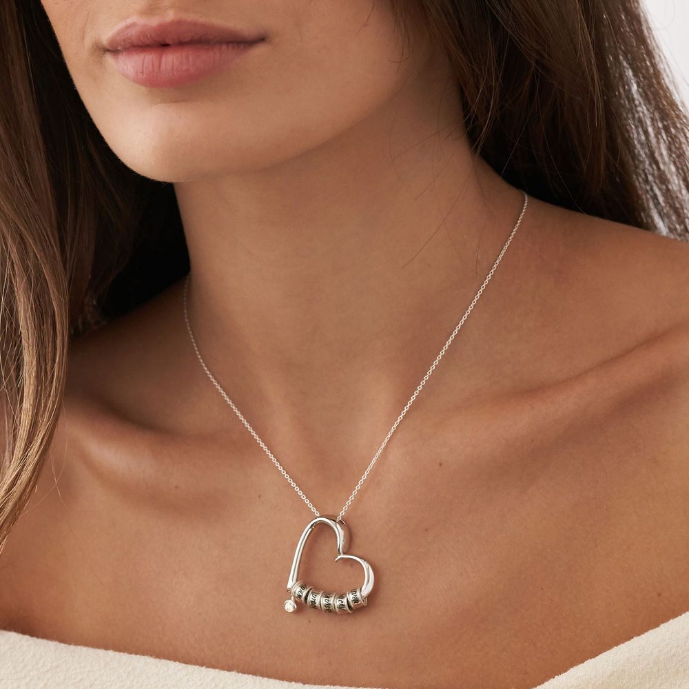 Charmevolle Herz-Halskette mit eingravierten Perlen und Diamant aus Sterlingsilber - 3 Produktfoto