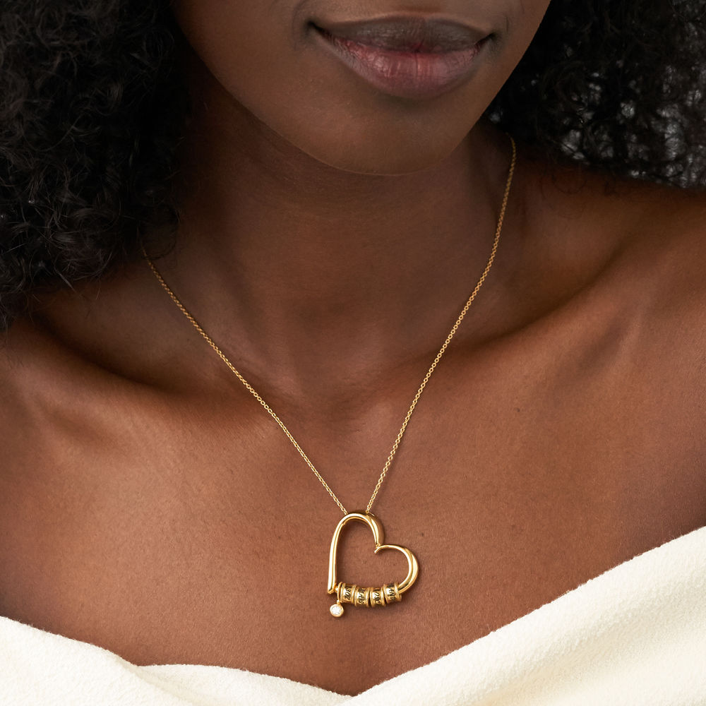 Charmevolle Herz-Halskette mit eingravierten Perlen und Diamant mit Goldplattierung - 3 Produktfoto