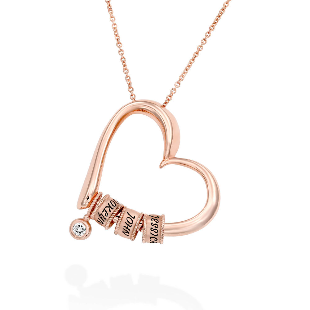 Charmevolle Herz-Halskette mit eingravierten Perlen und Diamant in Roségold Produktfoto