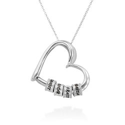 Charmevolle Herz-Halskette mit eingravierten Perlen in Sterling Silber Produktfoto