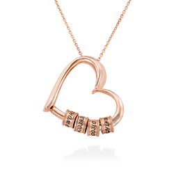 Charmevolle Herz-Halskette mit gravierten Perlen aus Rosévergoldetes Produktfoto