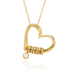 Charmante Herz-Halskette mit gravierten Perlen in Goldplattierung mit Produktfoto