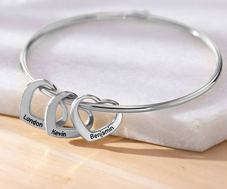 Bangle Bracelet with Heart Shape Pendants in Silver