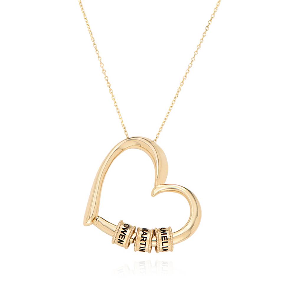 Charmerende hjertehalskæde med ingraverede charms i 10k guld produkt billede