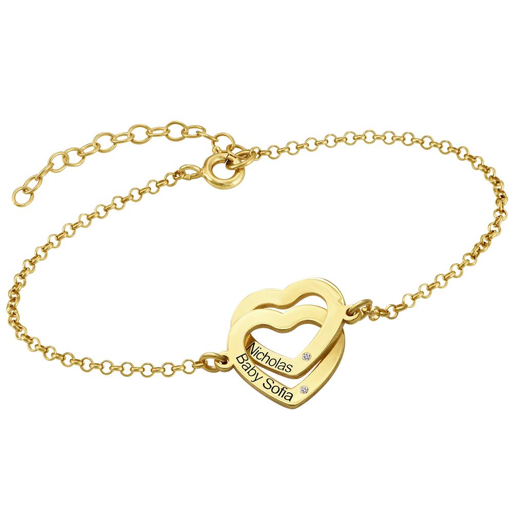 Claire armbånd justerbart med lenkede hjerter og diamanter i 14k gull produktbilde