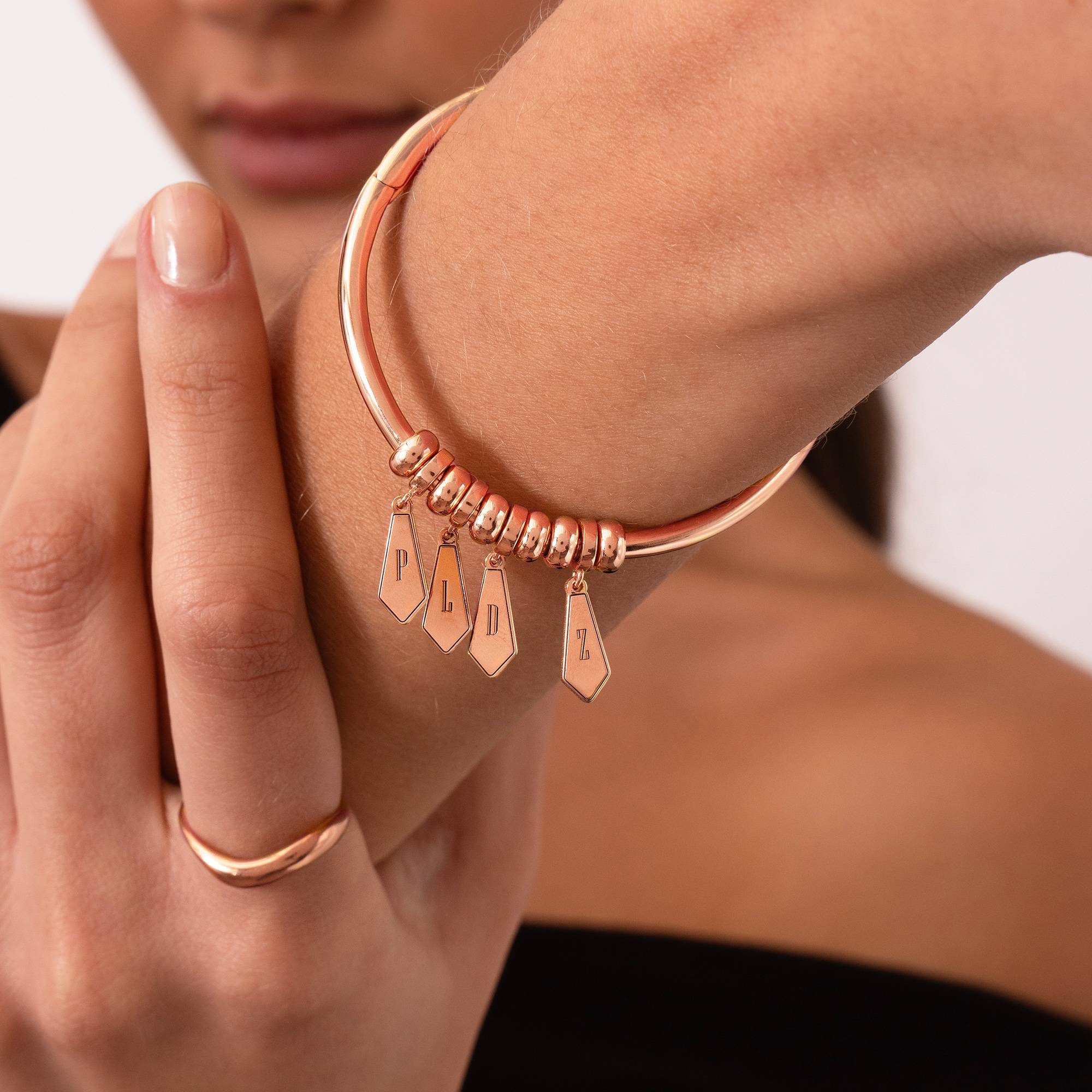 Gia Drop Initial Bangle Bracelet in 18K Rose Gold Plating-1 product photo