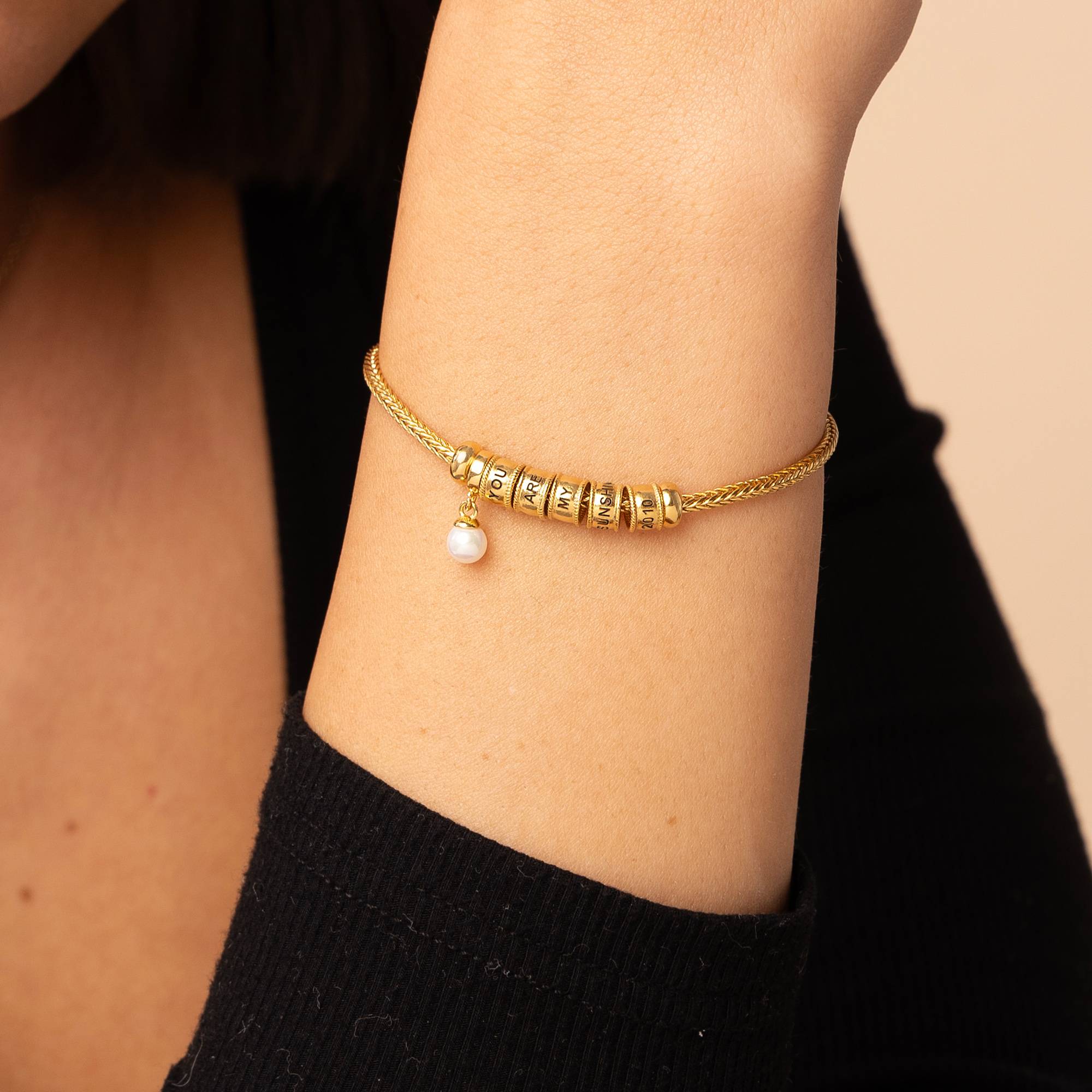 Linda Charm-Armband mit Perle und Herzverschluss - 750er vergoldetes Silber-4 Produktfoto