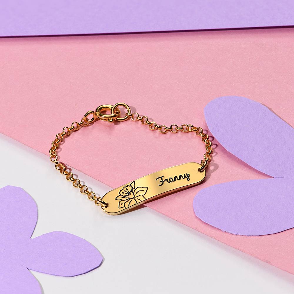 Bracelet prénom Lyla avec fleur de naissance en or jaune 14 carats-1 photo du produit