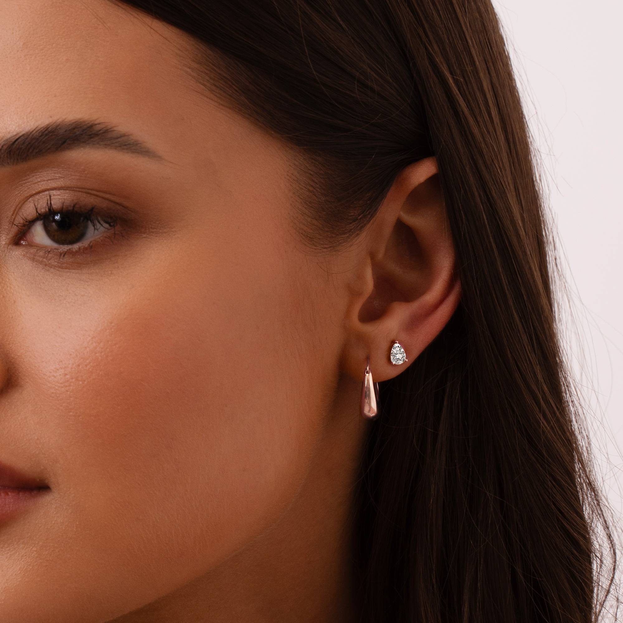 Raquel Triangle Stud Earrings in 18K Rose Gold Plating-2 product photo