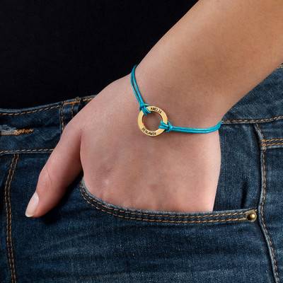 Gold Plated Circle Bracelet with Leather Style Cord product photo