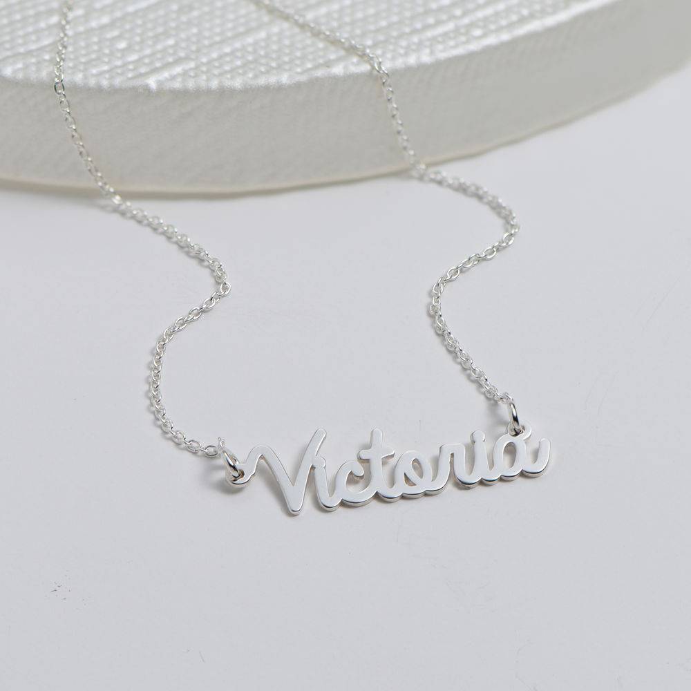 Tiny Personalized Cursive Name Necklace in Premium Silver product photo